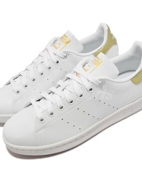 adidas White Leather Sneakers with Gold Heel Tab and Tongue Accents